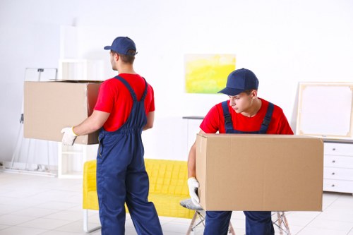 Professional team packing office equipment for relocation in Harrow