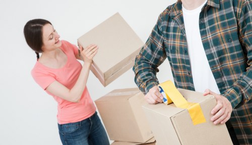 Happy customers after a successful move with Harrow Removals