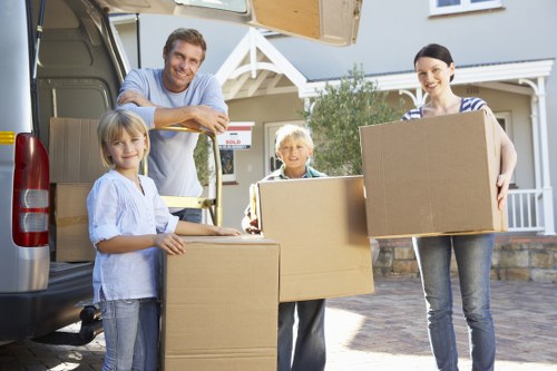 Happy customers during relocation with Harrow Van Services