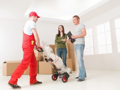 Customer reviewing Harrow Removals services